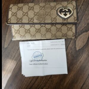 Gucci Beige Monogram Wallet with Gold Accent